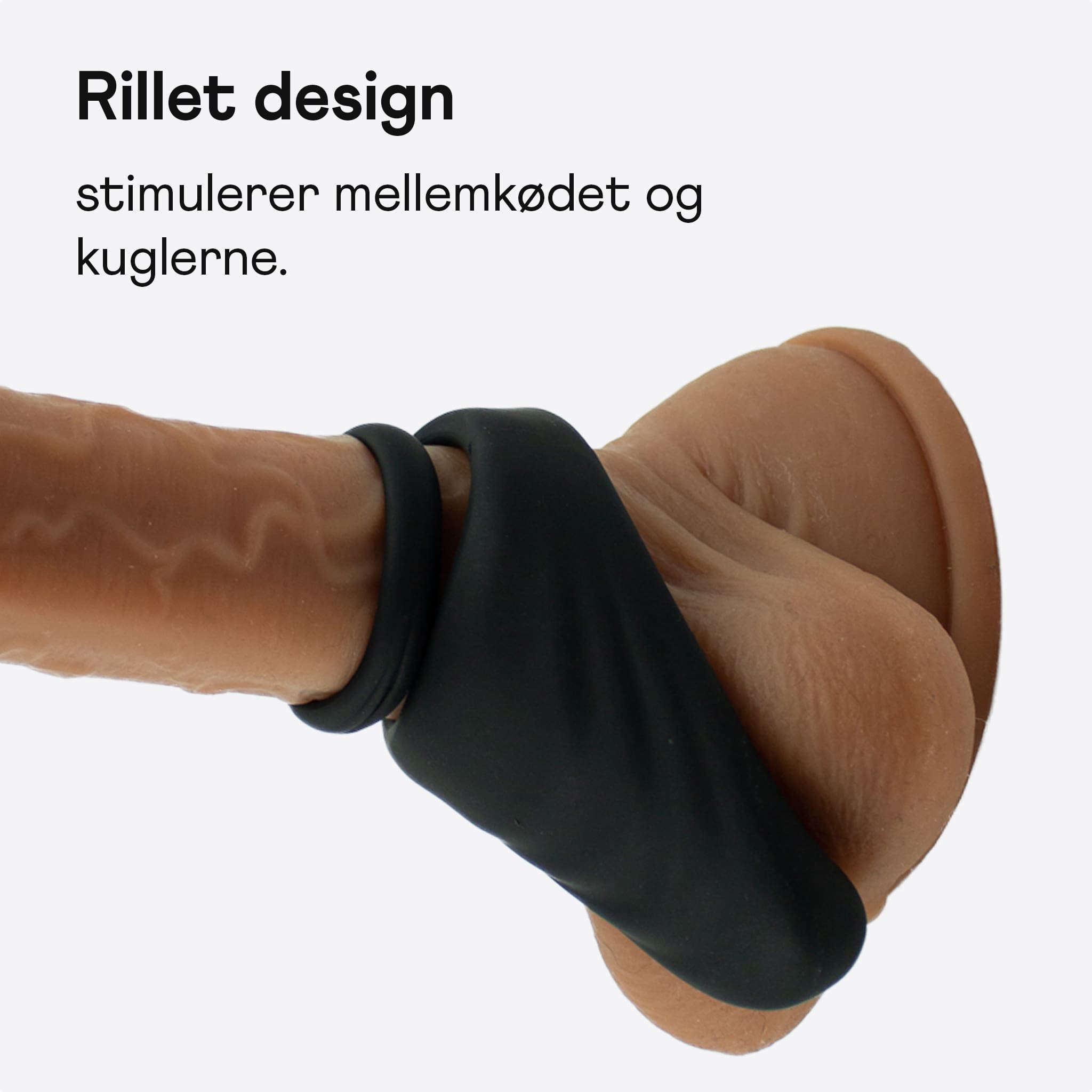 Unilove Aplha dual penis ring illustreret på pening
